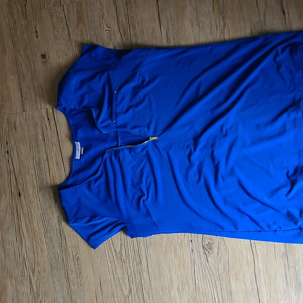 Pretty blue top. Great top for dressing up. Foz and Ali is the brand.